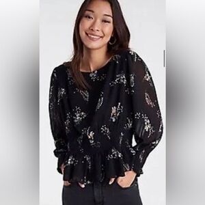New without tags, floral blouse, stretchy smocked detailing at the waist.